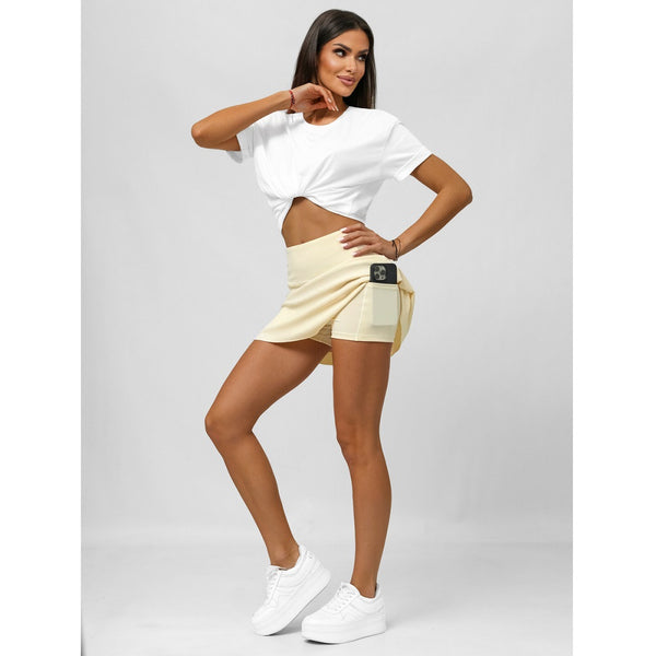 Kjol för damer - Beige Träningskjol sidan