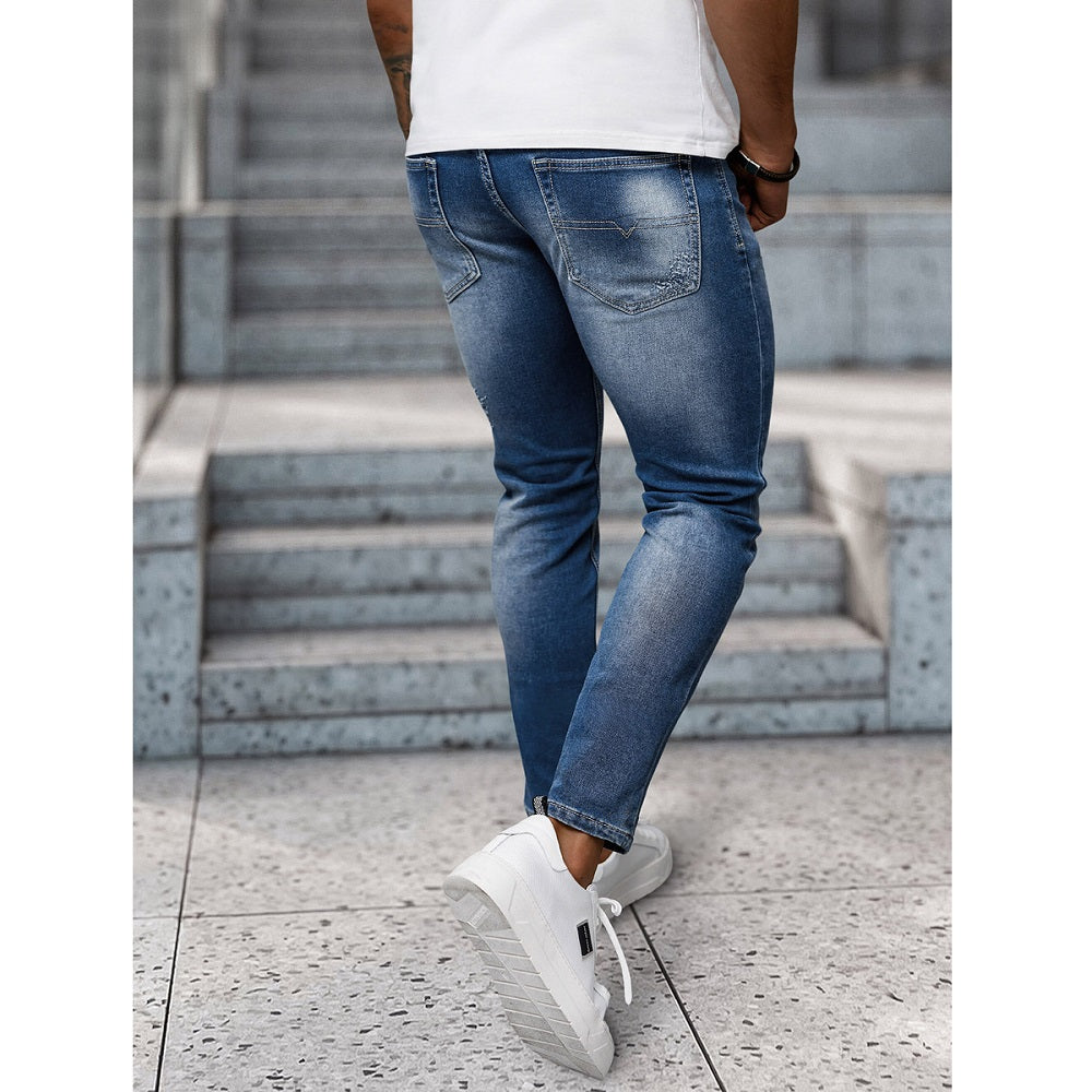 Blåa jeans med trendiga slitningar - Herr bakifrån