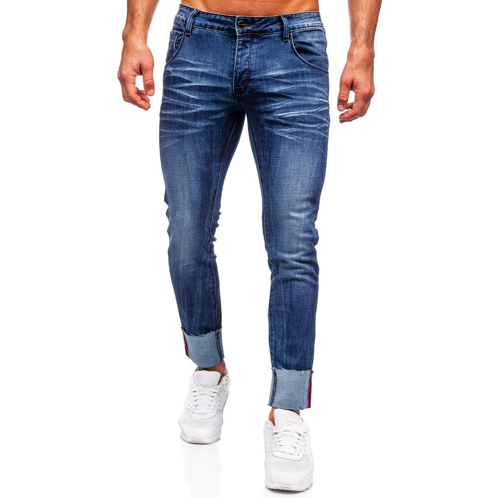 Mörkblå slim fit jeans - Snygga slitningar herr framifrån