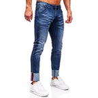 Mörkblå slim fit jeans - Snygga slitningar herr