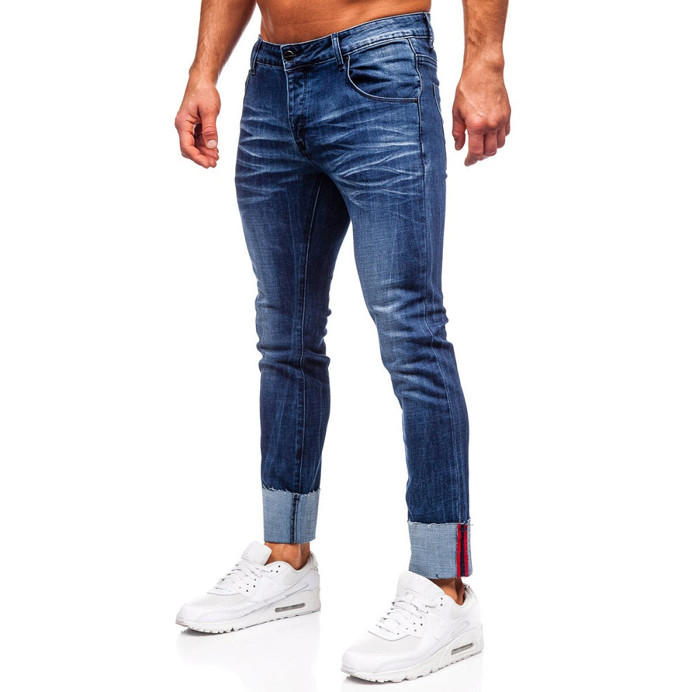 Mörkblå slim fit jeans - Snygga slitningar herr sidan
