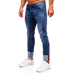 Mörkblå slim fit jeans - Snygga slitningar herr sidan