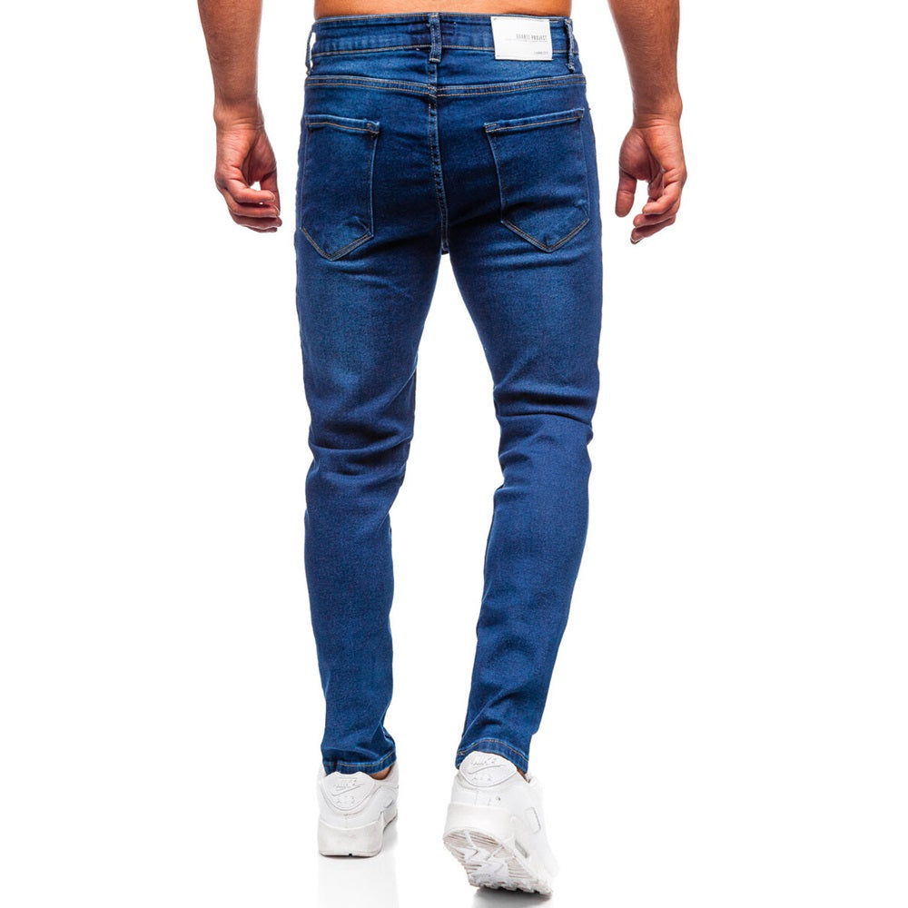 Mörkblå slim fit herrjeans bakifrån