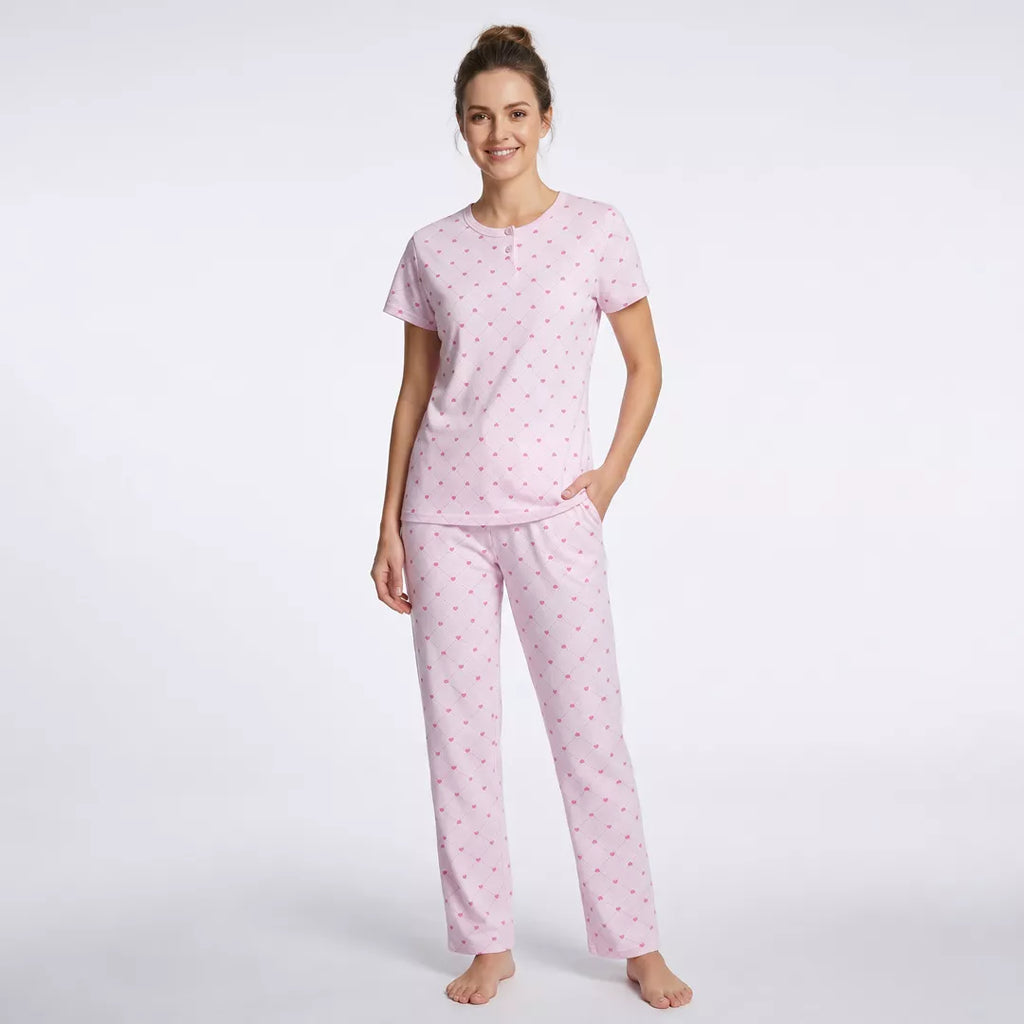 Kortärmad pyjamas dam i 100% bomull från Gaubert med rosa hjärtmönster och långa pyjamasbyxor modell framifrån