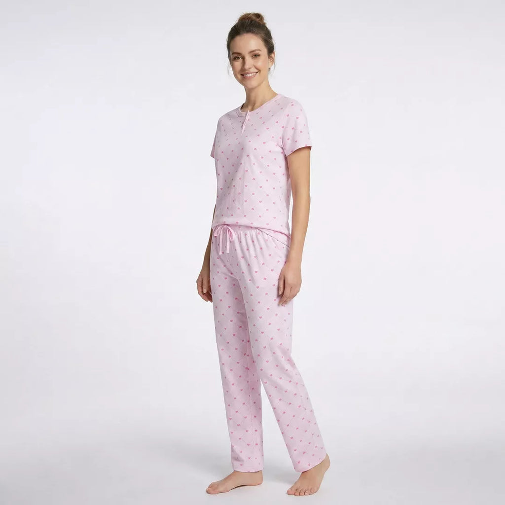 Kortärmad pyjamas dam i 100% bomull från Gaubert med rosa hjärtmönster och långa pyjamasbyxor modell från sidan