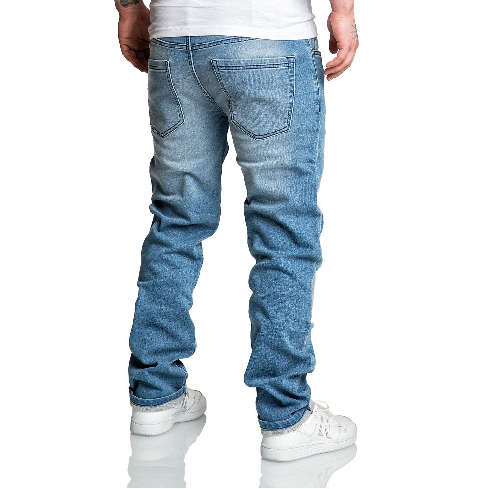 Ljusblåa stretchjeans herr bakifrån