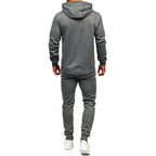 Mörkgrå träningsoverall - Byxa och hoodie bakifrån