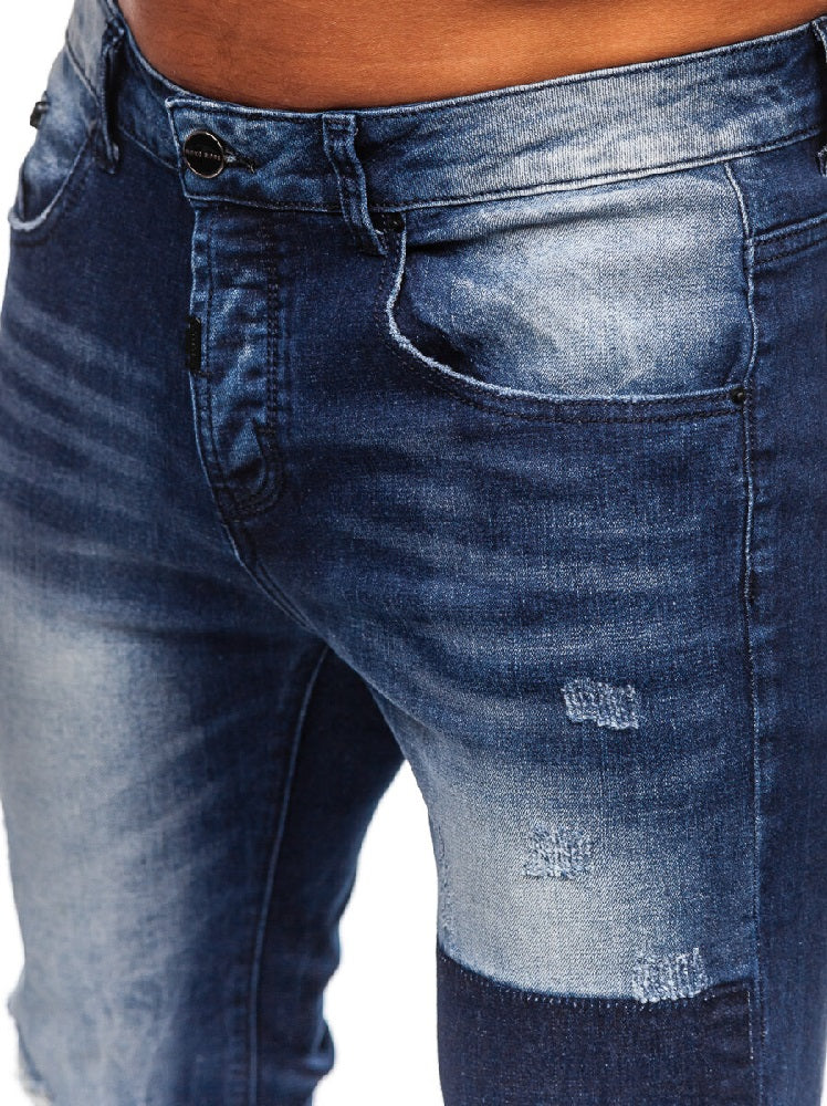 Blå slitna jeans med lagningslappar - Herr zoomad