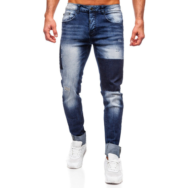 Blå slitna jeans med lagningslappar - Herr