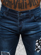 Slitna herrjeans med patches - Jeansbyxa zoomad fram