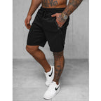 Svarta billiga herrshorts framifrån
