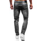Jeans med målarstänk - Slitna herrjeans bakifrån