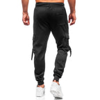 Svarta sweatpants - Polyester mjukisbyxor bakifrån