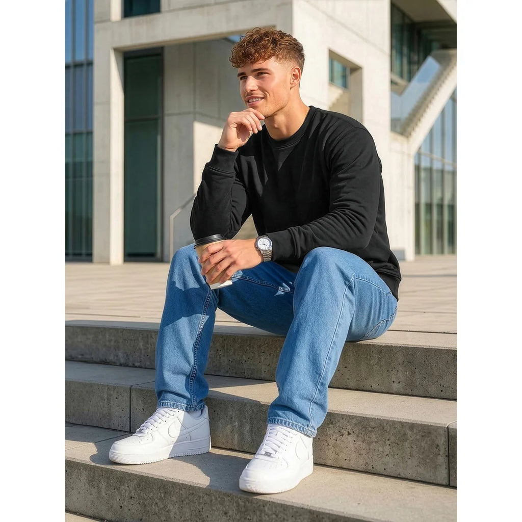 Billig svart sweatshirt herr sittande modell
