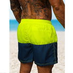 Badshorts för herrar i gult och mörkblått bakifrån