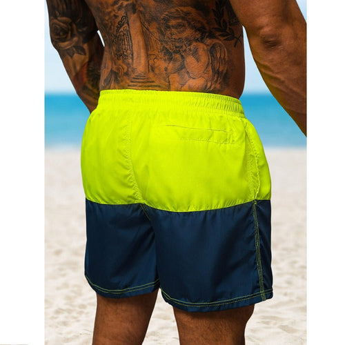 Badshorts för herrar i gult och mörkblått bakifrån