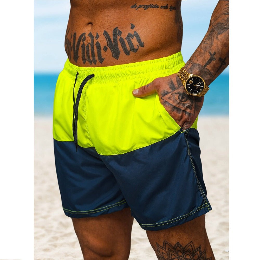 Badshorts för herrar i gult och mörkblått framifrån