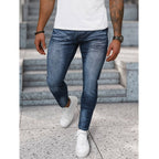 Blåa Jeans med hängsmycke - Herrjeans framifrån
