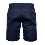 Mörkblåa finshorts från Amaci & Sons - Chinos shorts bakifrån