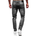Jeans med målarstänk - Slitna herrjeans bakifrån
