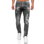 Jeans med målarstänk - Slitna herrjeans framifrån
