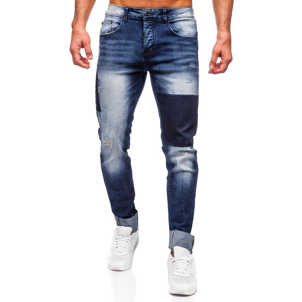 Blå slitna jeans med lagningslappar - Herr