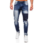 Blå slitna jeans med lagningslappar - Herr