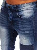 Blå slitna jeans med lagningslappar - Herr zoomad