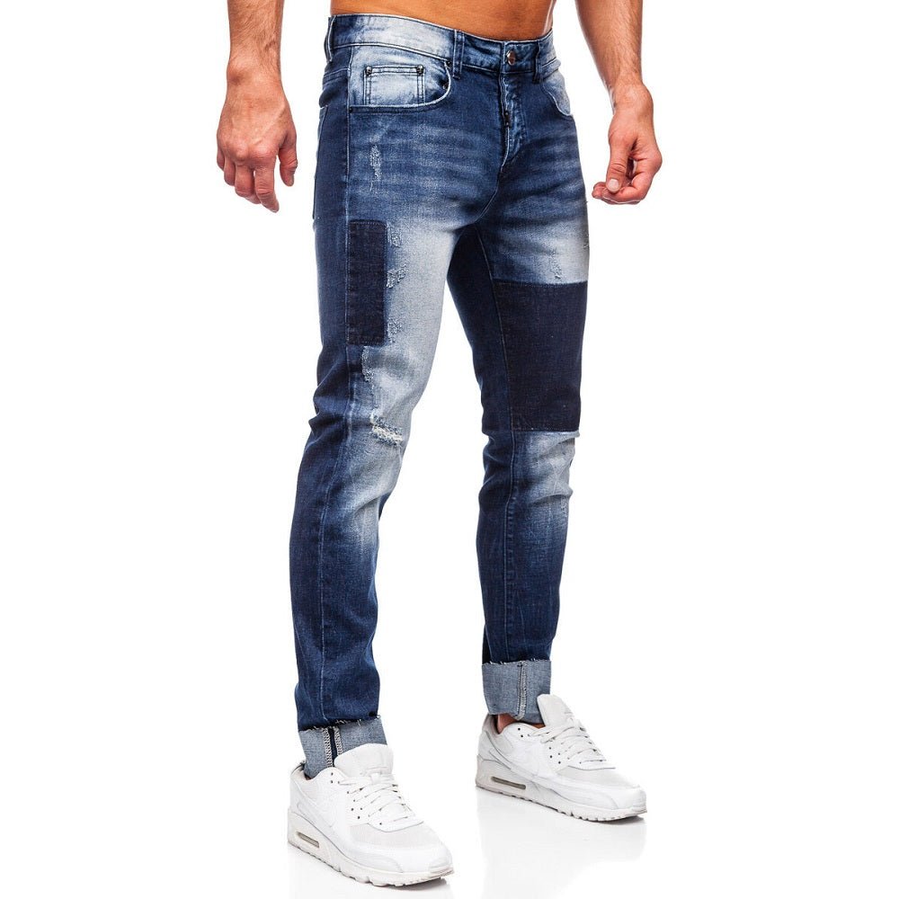Blå slitna jeans med lagningslappar - Herr sidan