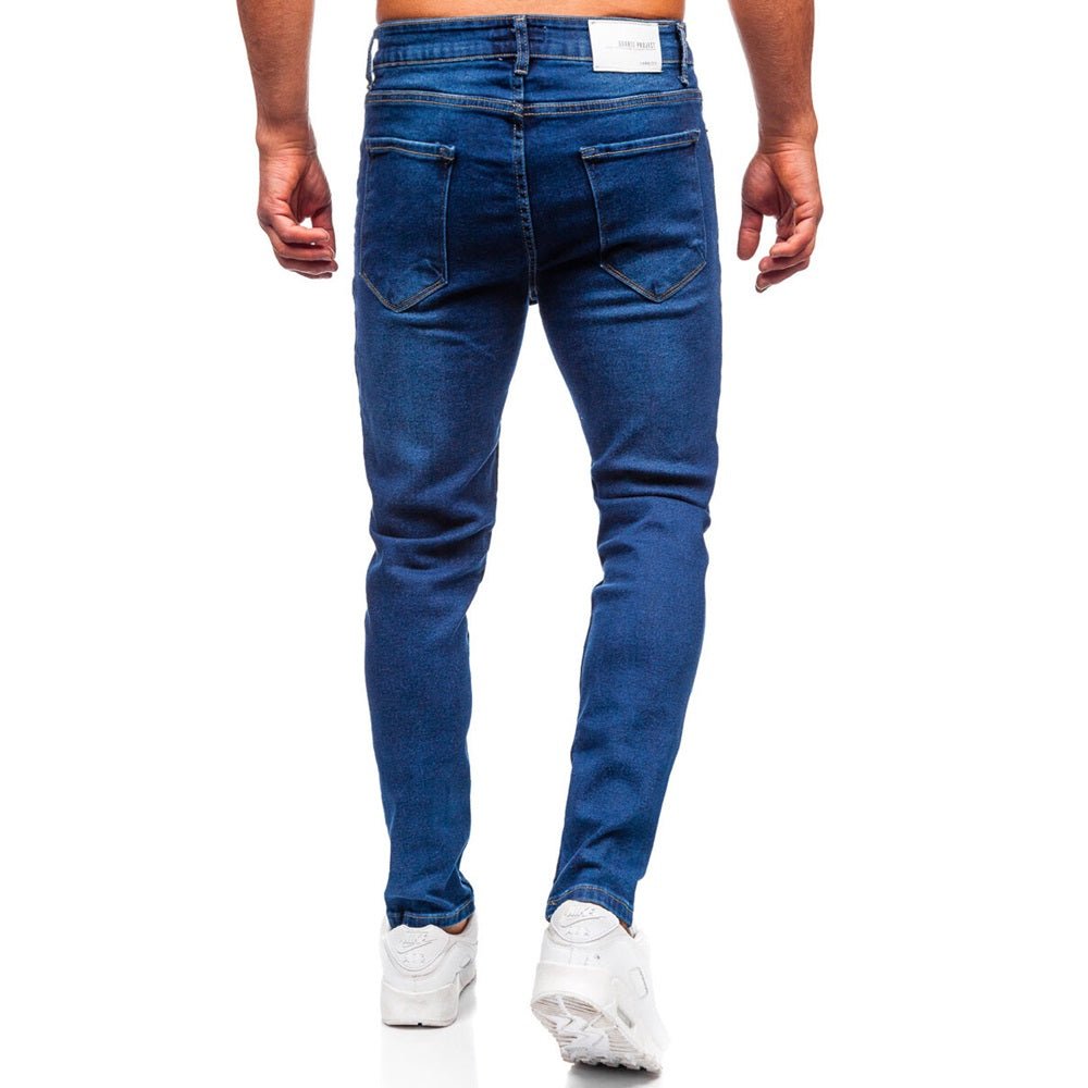Mörkblå slim fit herrjeans bakifrån