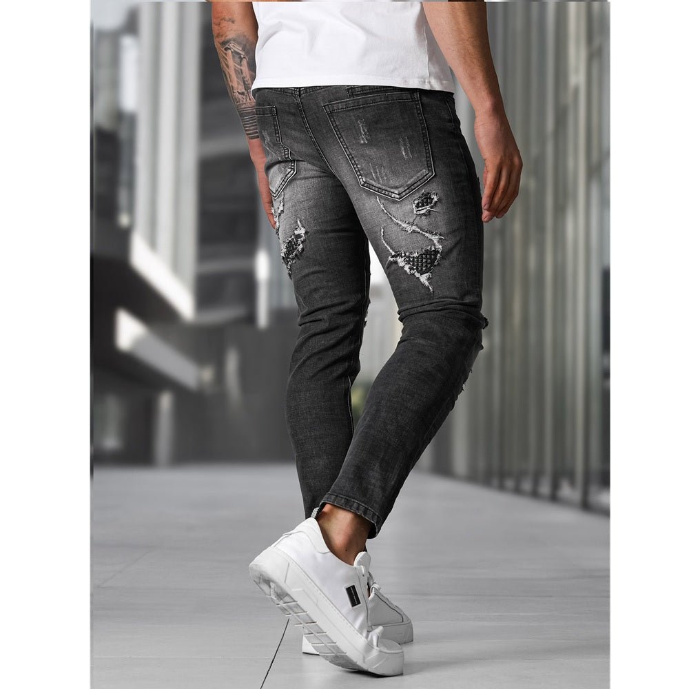 Herrjeans slim fit svarta jeans bakifrån