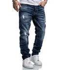 Mörkblåa straight fit jeans från amaci & sons framifrån