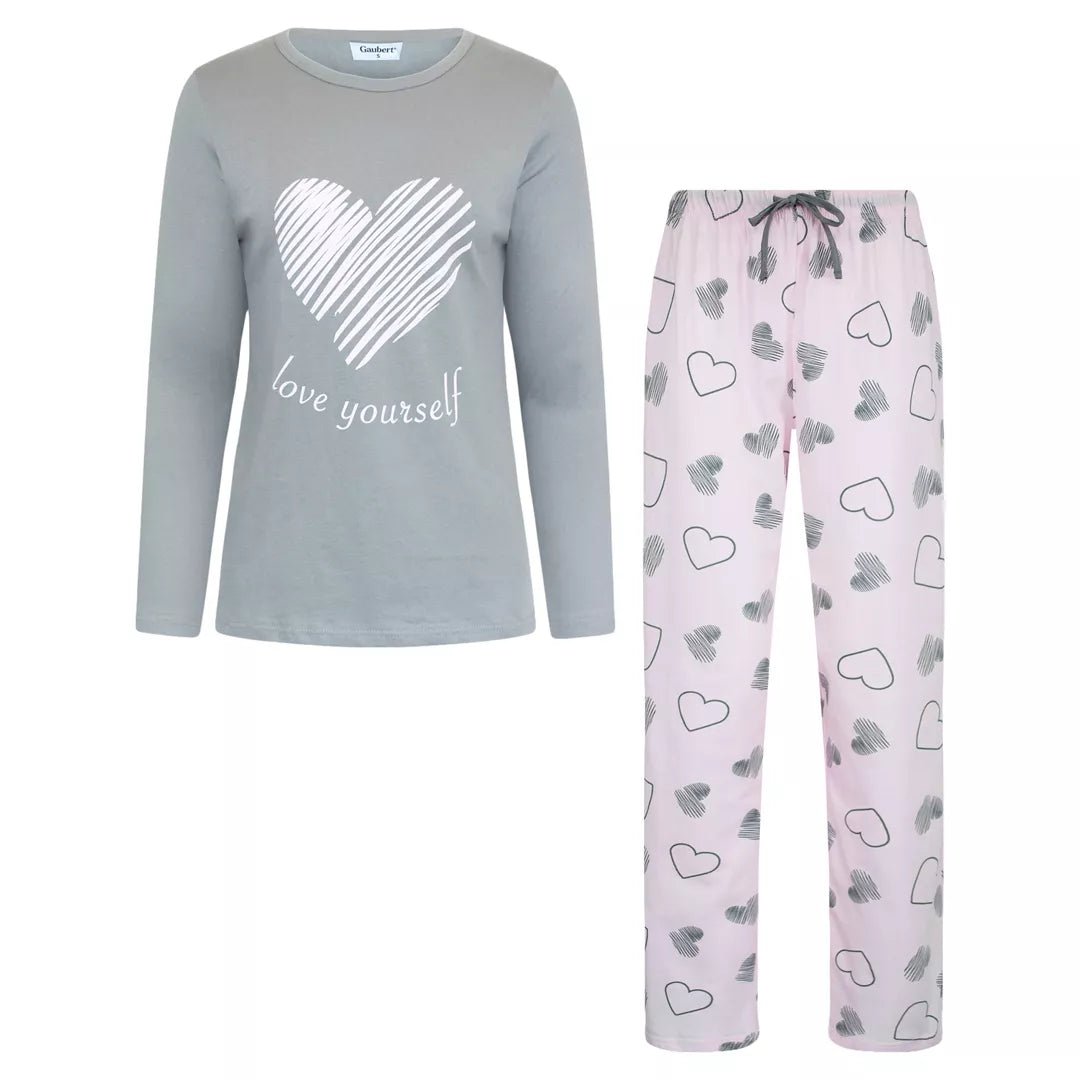 Rosa pyjamasbyxor i 100% bomull med hjärtmönster, dragsko och sidofickor.