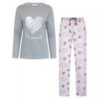 Rosa pyjamasbyxor i 100% bomull med hjärtmönster, dragsko och sidofickor.