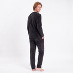 Svart fleece pyjamas herr Gaubert – pyjamasset bakifrån