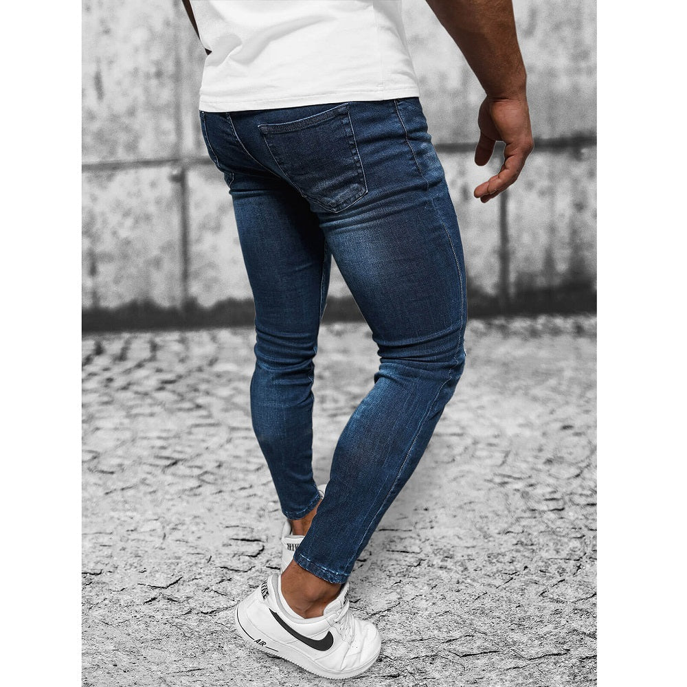 Slitna herrjeans med patches - Jeansbyxa bakifrån