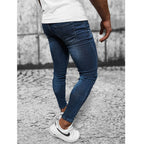 Slitna herrjeans med patches - Jeansbyxa bakifrån