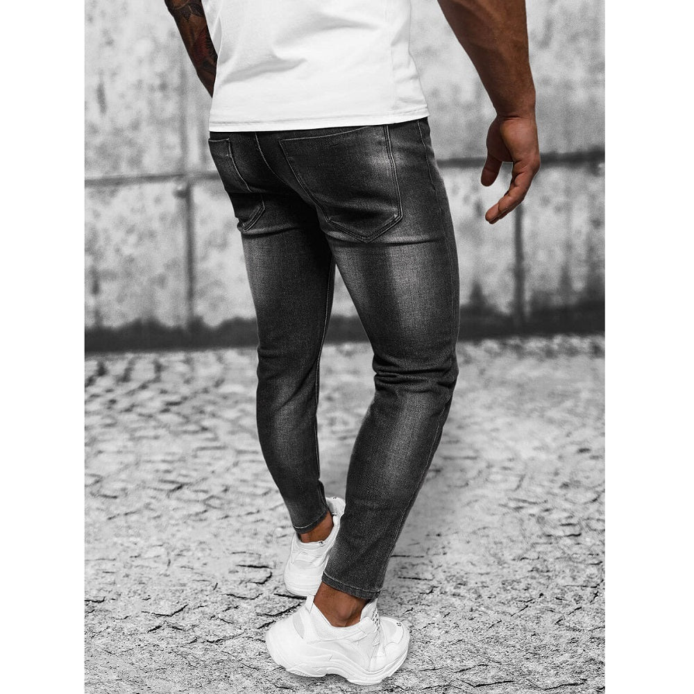 Skuggade jeans - Svarta slim fit herr bakifrån