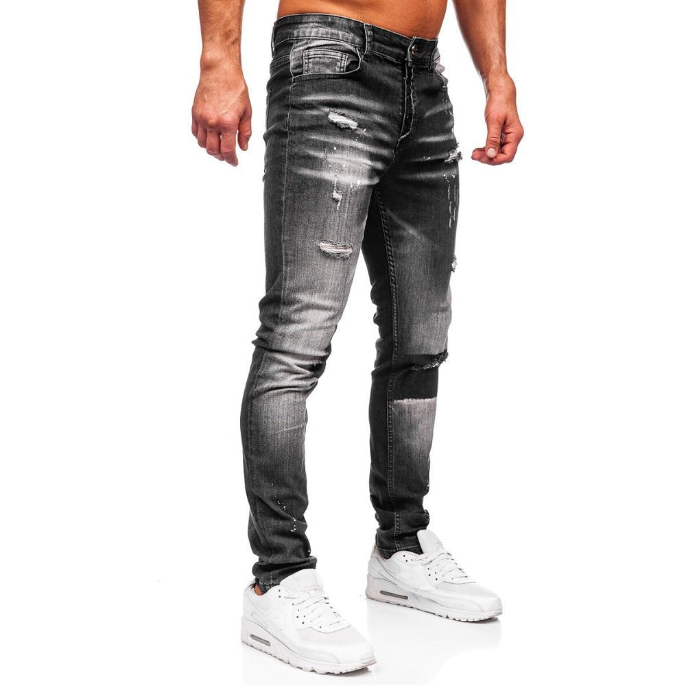 Slitna slim fit jeans - Svarta med målarfläckar sidan