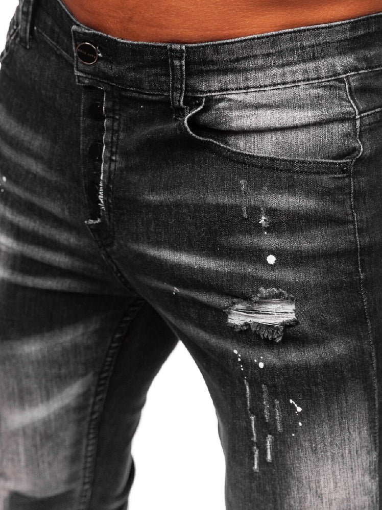 Slitna slim fit jeans - Svarta med målarfläckar zoomad