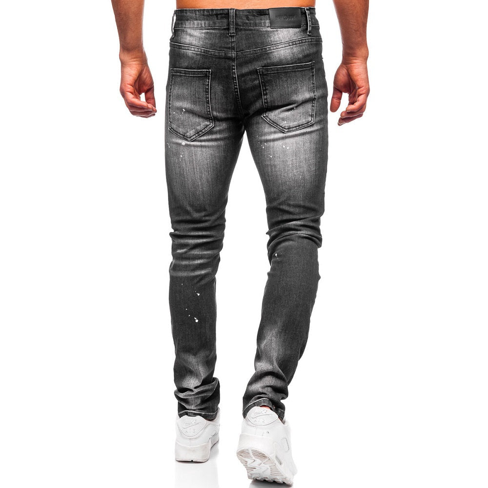Slitna slim fit jeans - Svarta med målarfläckar bakifrån