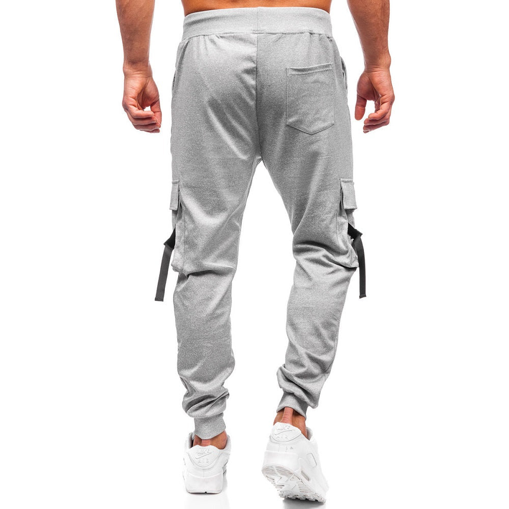 Ljusgråa sweatpants - Polyester mjukisbyxor bakifrån