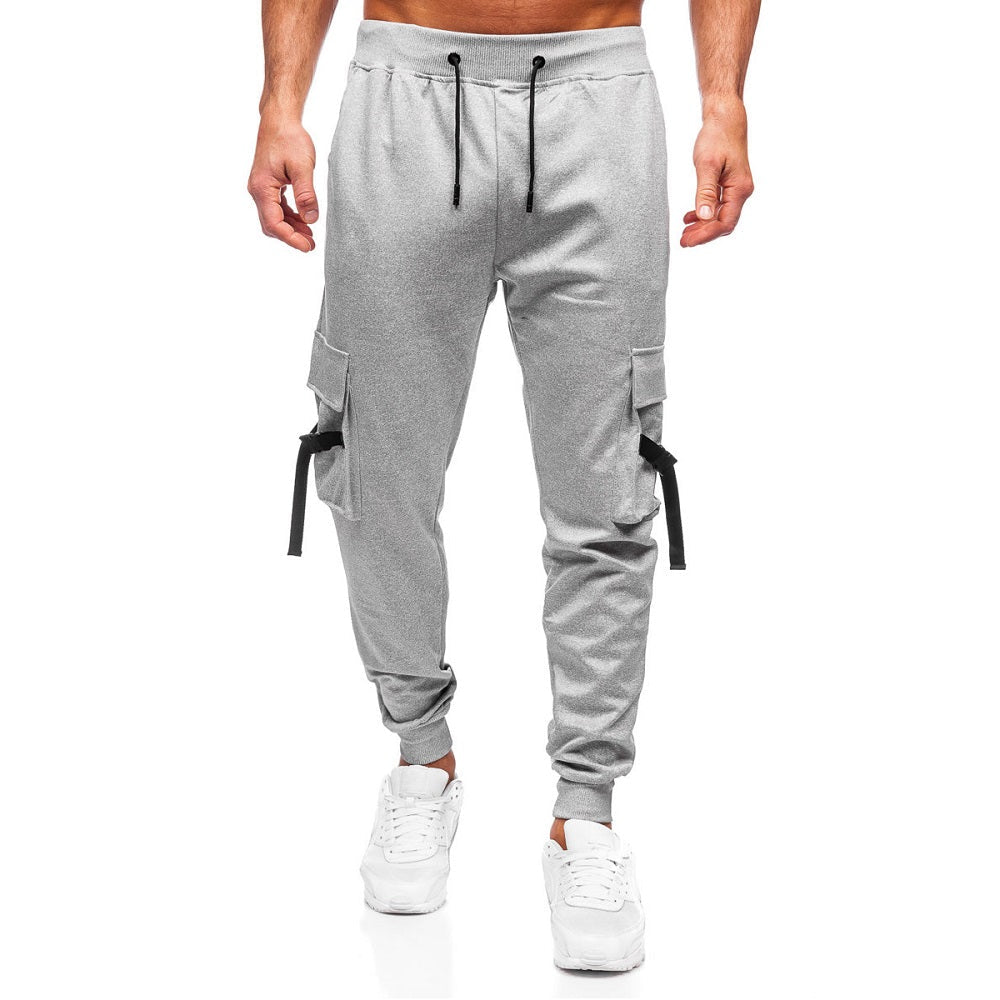 Ljusgråa sweatpants - Polyester mjukisbyxor framifrån