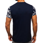 T-shirt med tryckt graffiti motiv - Herr